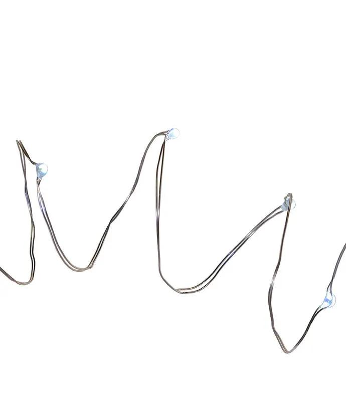 Battery operated 50-light LED fairy light string in cool white on a flexible wire on Tampa Home & Garden Store