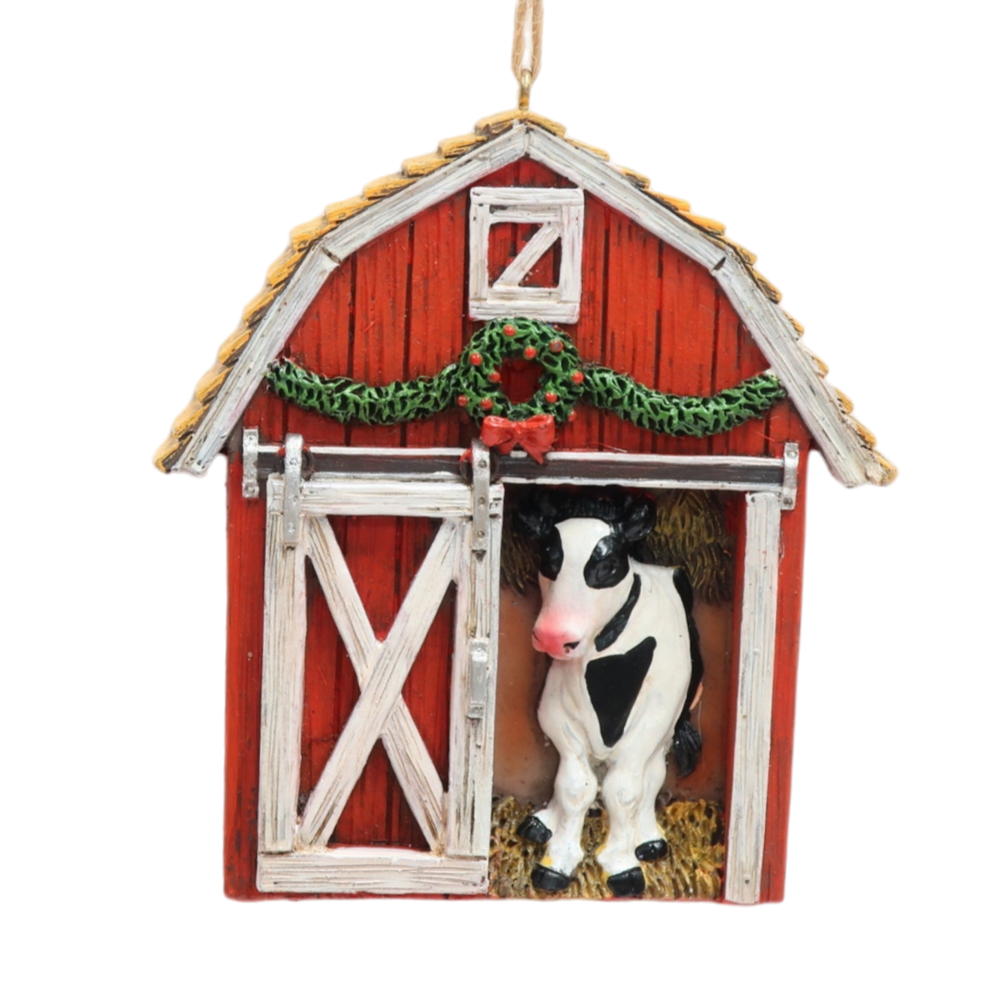 Granero navideño con adorno de vaca