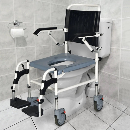 4-in-1 bedside commode wheelchair with bucket, white frame, black padding, caster wheels on Tampa Home & Garden Store