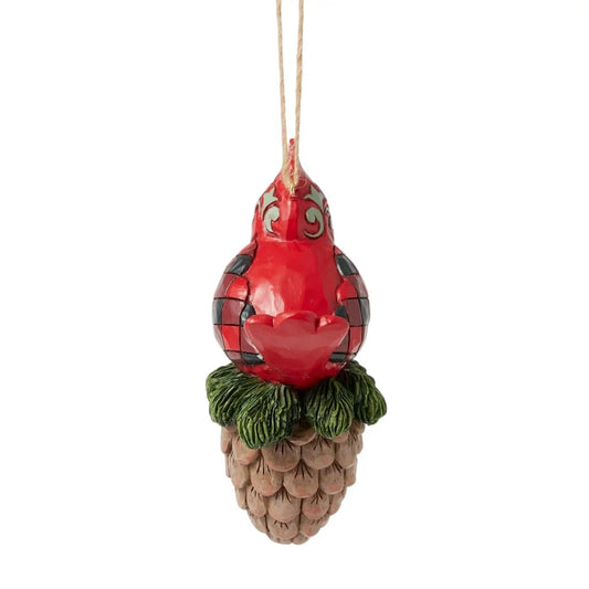 Highland Glen Cardinal Ornament red ceramic cardinal on a pinecone base with green leaves on Tampa Home & Garden Store