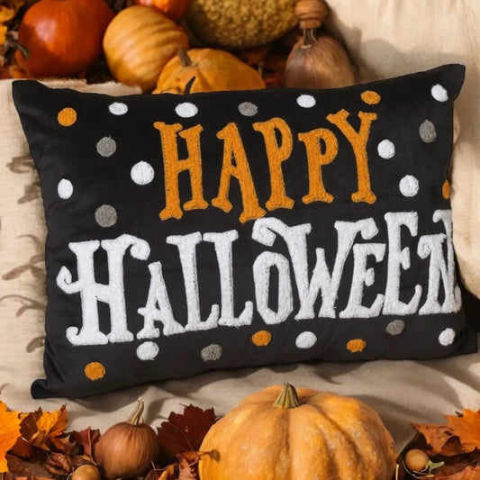 Happy Halloween Pillow with polka dot velour on black background featuring orange letters on Tampa Home & Garden Store