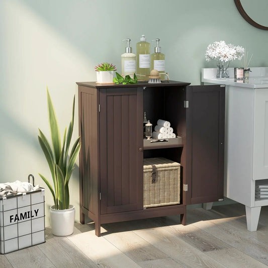 Brown bathroom floor cabinet with double doors, open interior shelf and towels on Tampa Home & Garden Store
