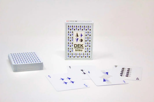 DEK of Cards Sisu Finnish Playing Cards deck with purple geometric back box nearby on Tampa Home & Garden Store