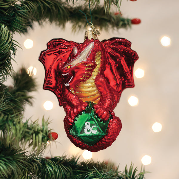 Dungeons & Dragons red dragon ornament with gold belly and green treasure bag on Christmas tree on Tampa Home & Garden Store