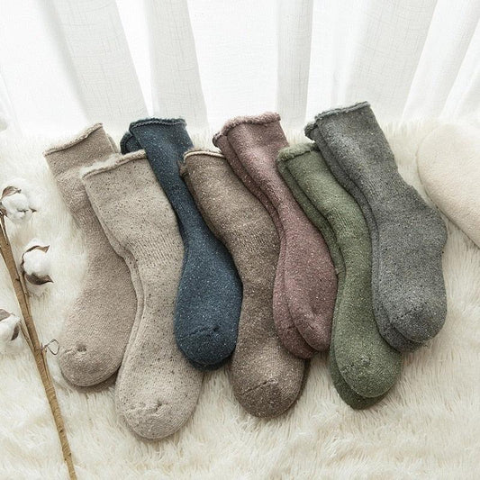 Thick merino wool crew socks in 7 solid colors, unisex warm winter socks on soft fur surface on Tampa Home & Garden Store