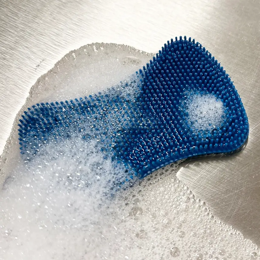 Blue silicone dish sponge with dense bristles and scrubby texture for dishes and counters on Tampa Home & Garden Store