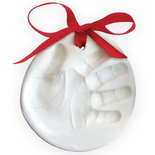 Baby's First Christmas Handprint Ornament Kit white ornament with red ribbon bow on Tampa Home & Garden Store