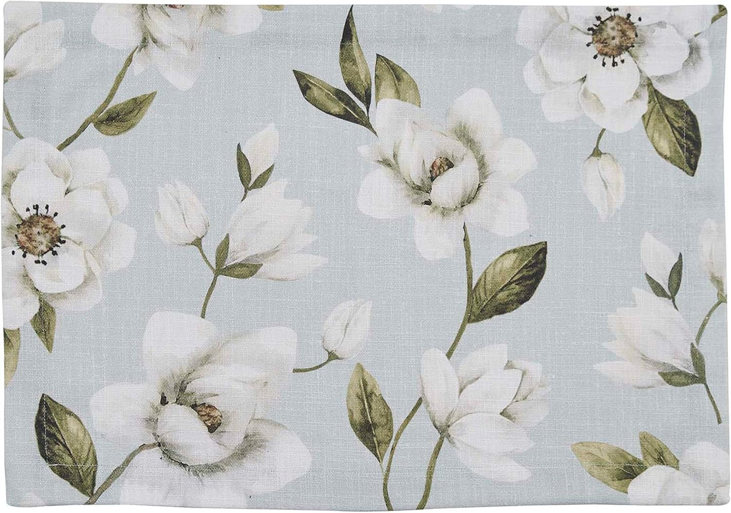 Magnolia floral placemat with blue design featuring white blooms and green leaves on blue on Tampa Home & Garden Store