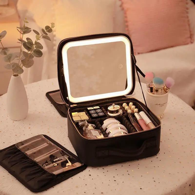 Large Capacity LED Mirror Makeup Bag with Divider, black opened to reveal cosmetics and brushes on Tampa Home & Garden Store