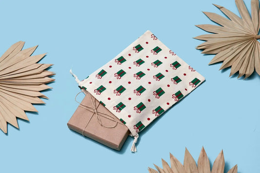 Cloth organic gift bags set of 4 with green pattern and red dots on blue background on Tampa Home & Garden Store