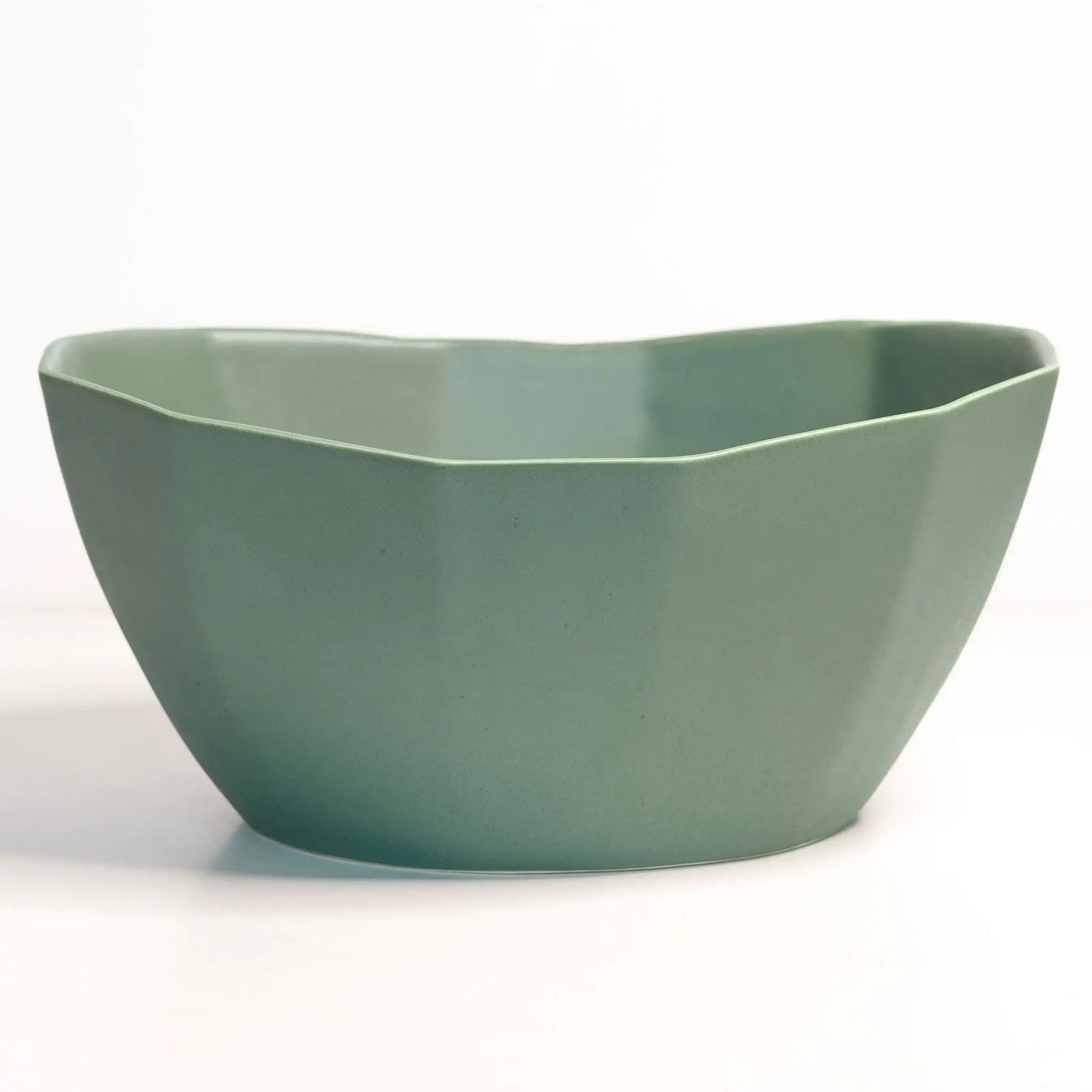 Large porcelain nesting bowl Ember Collective in sage green with smooth curved rim on Tampa Home & Garden Store