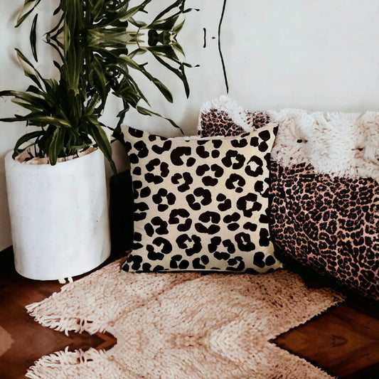 Leopard print throw pillows, two Gia Roma designs in beige and brown patterns on Tampa Home & Garden Store