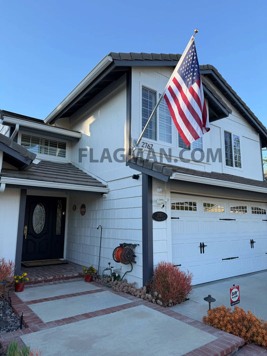8 ft Spinning Aluminum Wall Mount Flag Pole Kit Flagman of America on house with US flag on Tampa Home & Garden Store