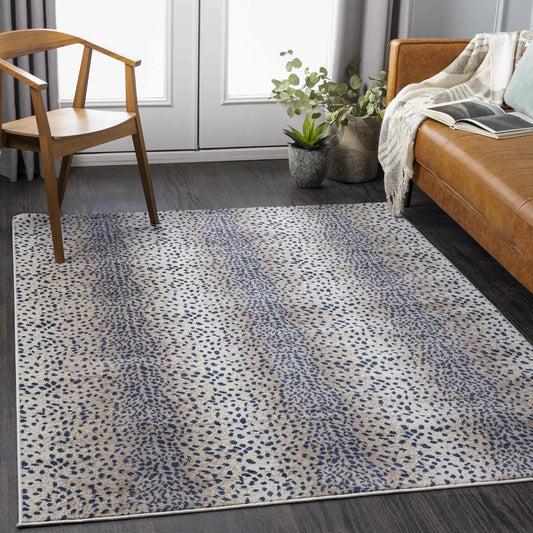 Pointblank Tan and Navy Leopard Print Area Rug by Boutique Rugs tan and navy leopard print on Tampa Home & Garden Store