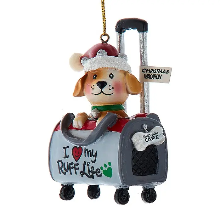 Dog in travel bag ornament with brown pup in rolling suitcase and Christmas Vacation tag on Tampa Home & Garden Store