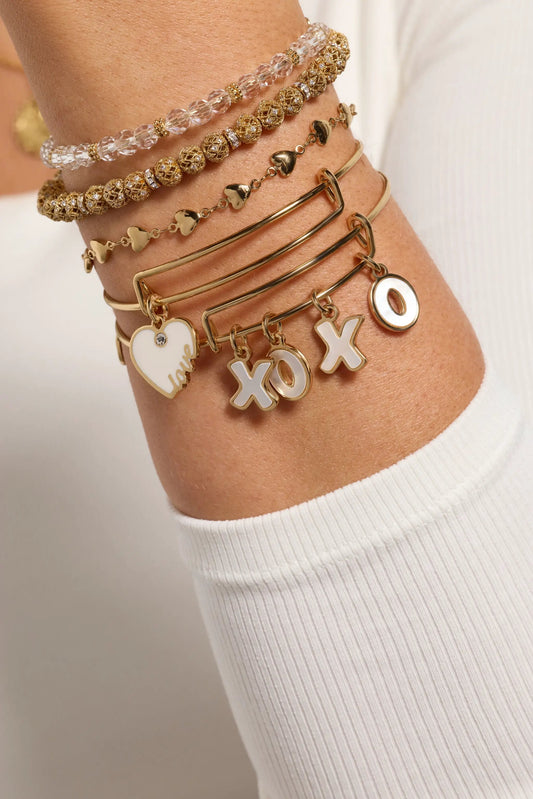 Love XOXO Bangle Set of 5 by Alex and Ani; gold-tone crystal bead bracelets with heart/XOXO on Tampa Home & Garden Store