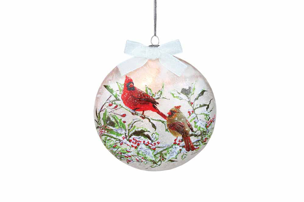 Adorno iluminado de acebo y cardenales