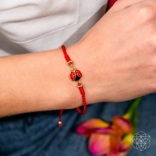 Bracelet Lucky Ladybug Four-Strand Red String with gold-tone charm by Conscious Items on Tampa Home & Garden Store