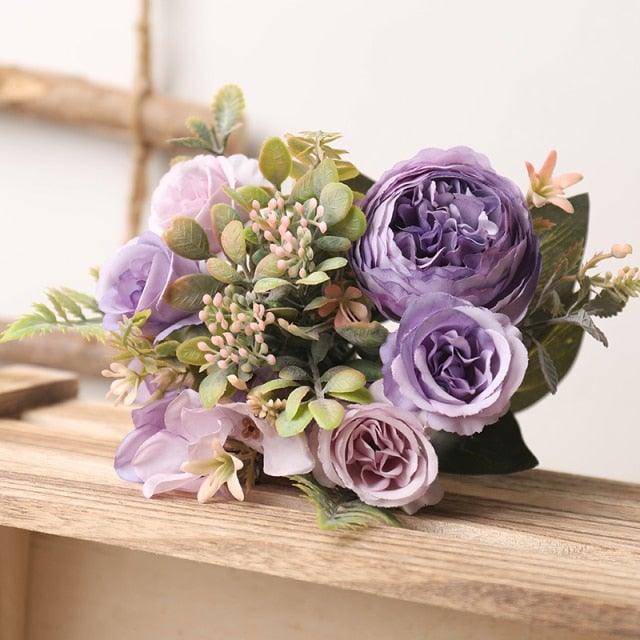 Stevvex artificial silk rose bouquet in lavender and lilac with greenery on wood surface on Tampa Home & Garden Store