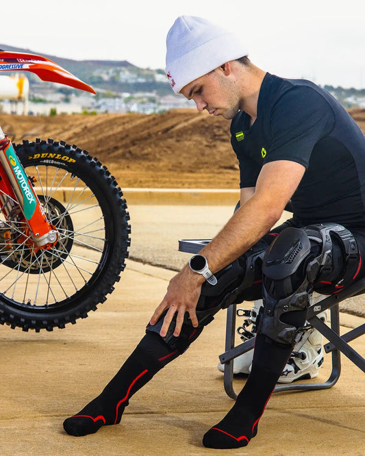 EVS Sports Web Eclipse Knee Braces in black for motorcycle knee protection worn by rider on Tampa Home & Garden Store