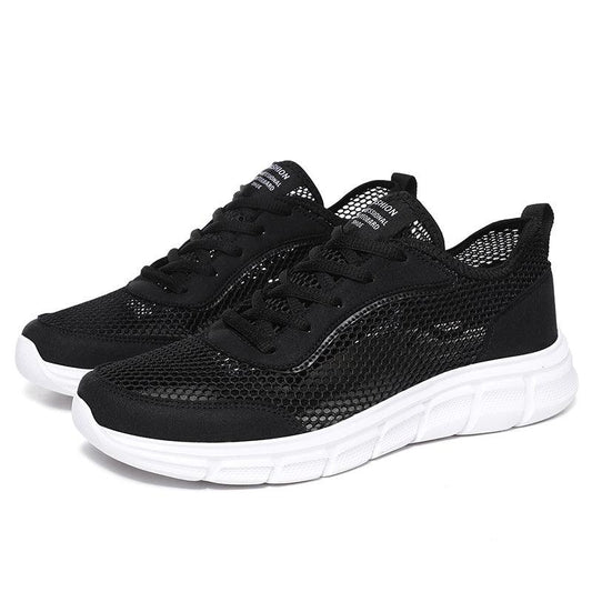 Stevvex men's black mesh sneakers pair with breathable upper and white sole on Tampa Home & Garden Store