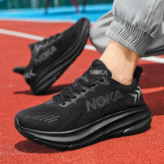 Pair of men's black breathable mesh running sneakers with NOKA branding on Tampa Home & Garden Store