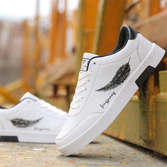 Men's Stevvex white sneakers with breathable upper and feather graphic non-slip sole on Tampa Home & Garden Store