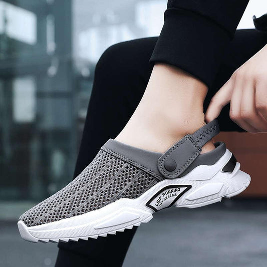 Mens slip-on athletic slippers with grey mesh upper and adjustable strap, white chunky sole on Tampa Home & Garden Store