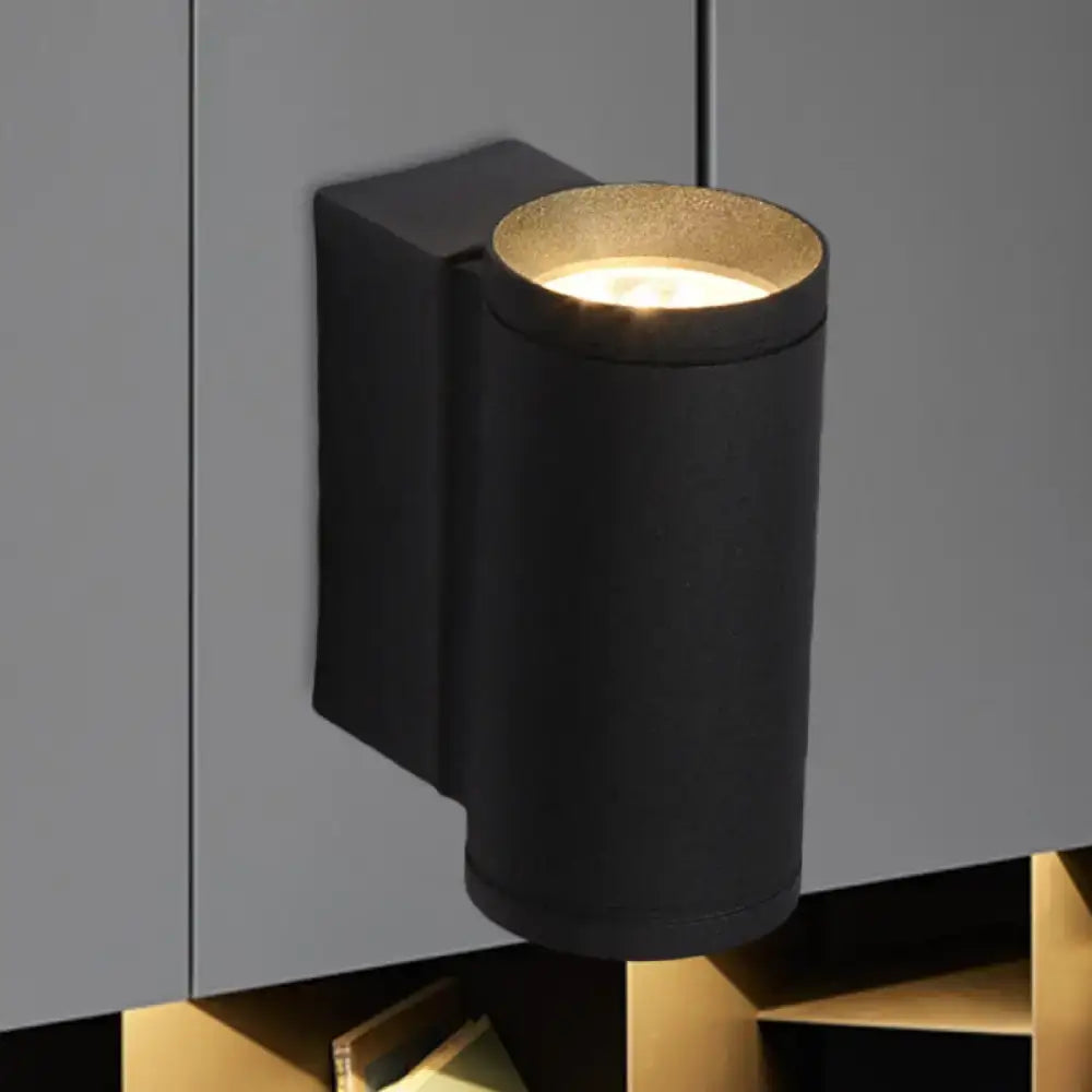 Black Metal Tubular Up-Down Wall Lamp Decorbites, wall mounted cylindrical fixture with warm glow on Tampa Home & Garden Store
