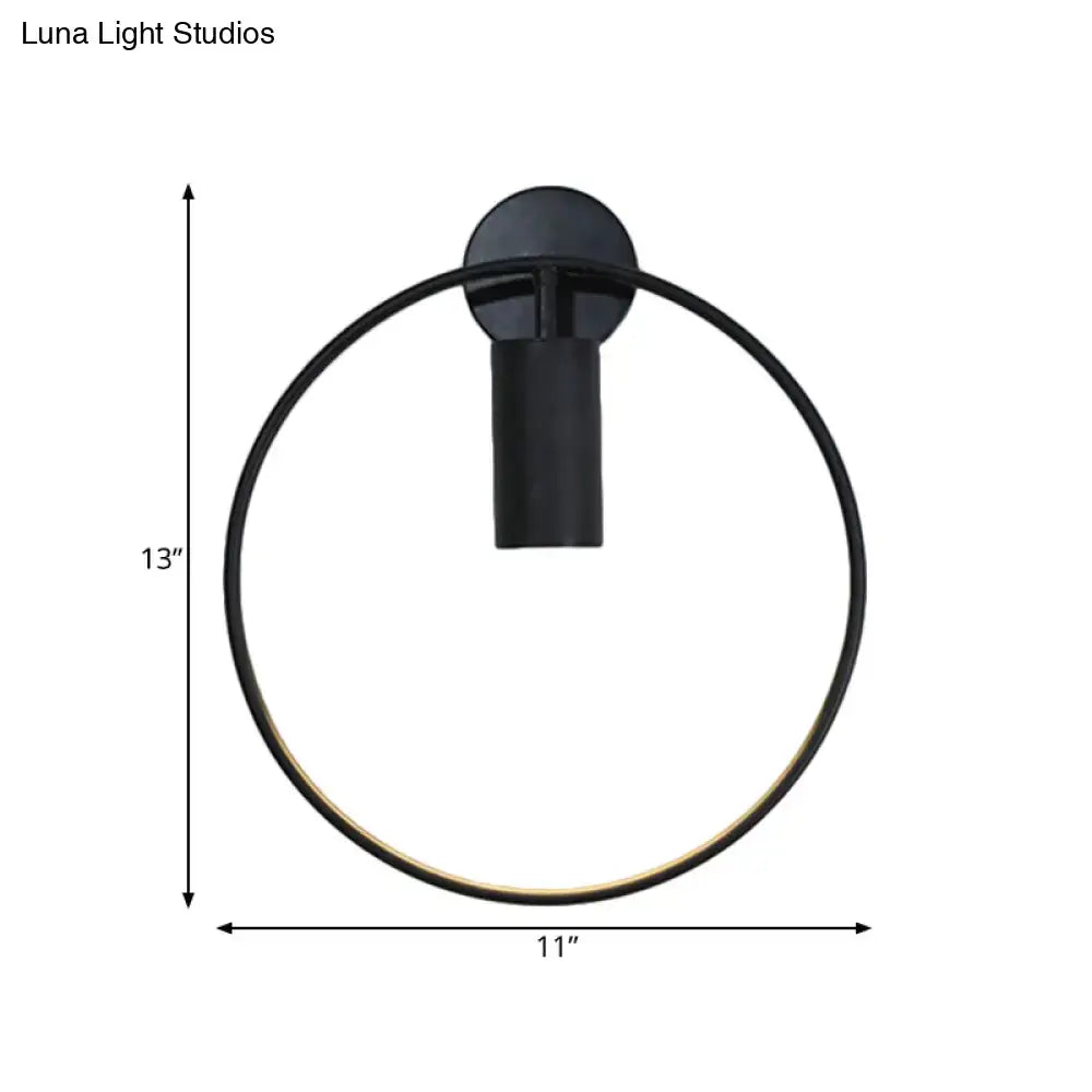 Black circular metal sconce with 11-in ring diameter and 13-in overall height by Decorbites on Tampa Home & Garden Store
