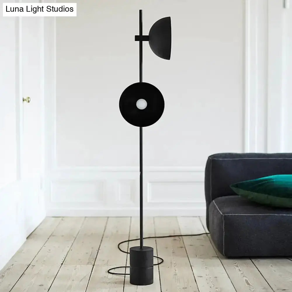 Minimalist black marble floor lamp with funnel shade on Tampa Home & Garden Store