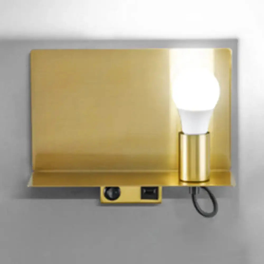 Minimalist wall light fixture by Decorbites with brass gold finish and exposed bulb on Tampa Home & Garden Store