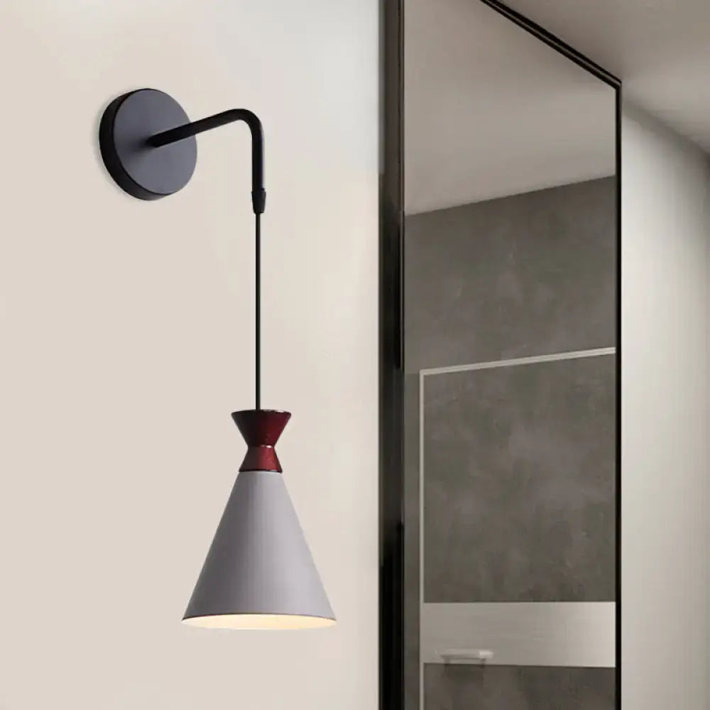 Black conical iron minimalist sconce by Decorbites with white shade and red collar on Tampa Home & Garden Store