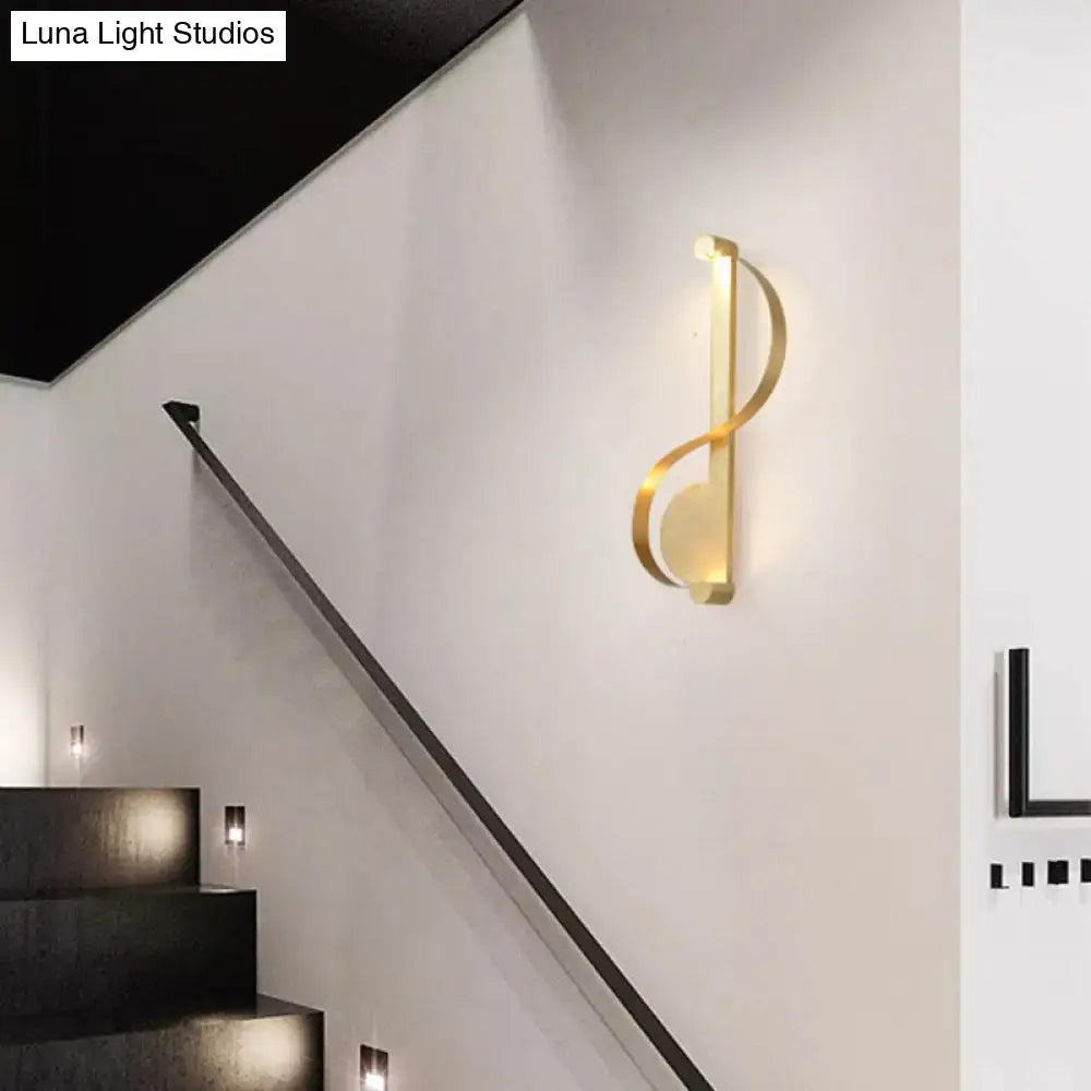 Brass Curve Wall Light by Decorbites, curved loop brass fixture warms stairs area on Tampa Home & Garden Store