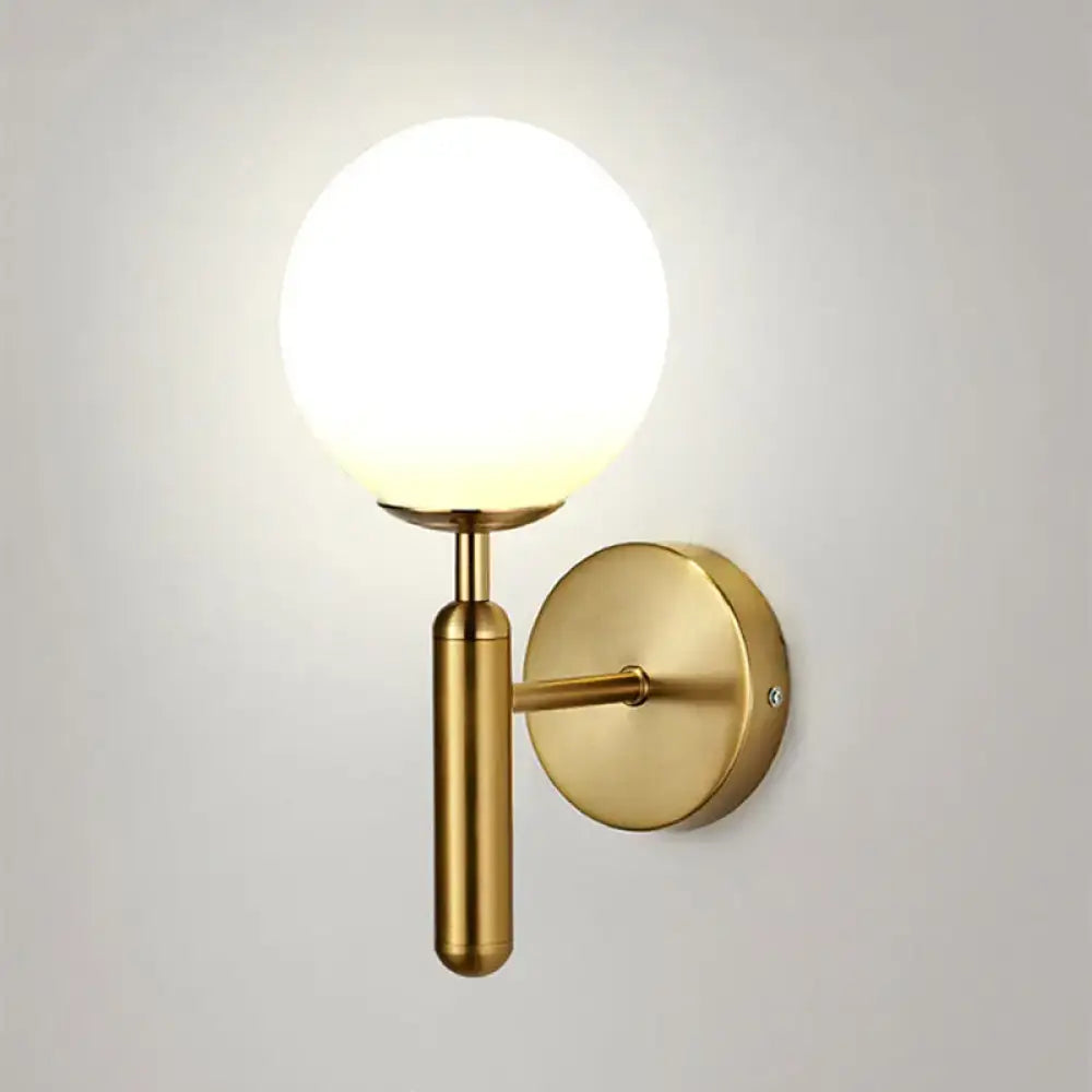 Black Gold Textured Glass Globe Sconce with brass finish and wall mount on Tampa Home & Garden Store