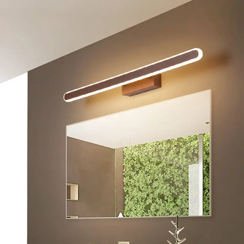 Brown LED vanity sconce, Decorbites wood-finish linear bar light above bathroom mirror on Tampa Home & Garden Store