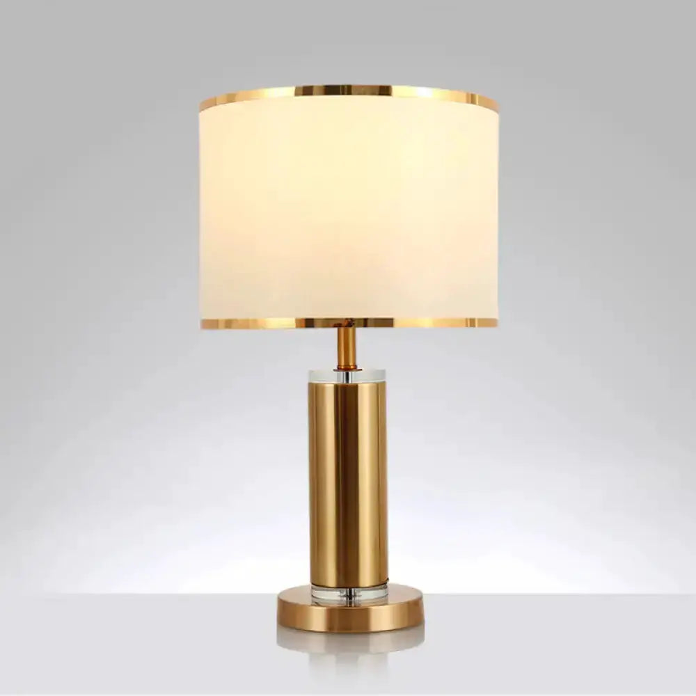 Brass nightstand lamp with white fabric drum shade by Decorbites on Tampa Home & Garden Store