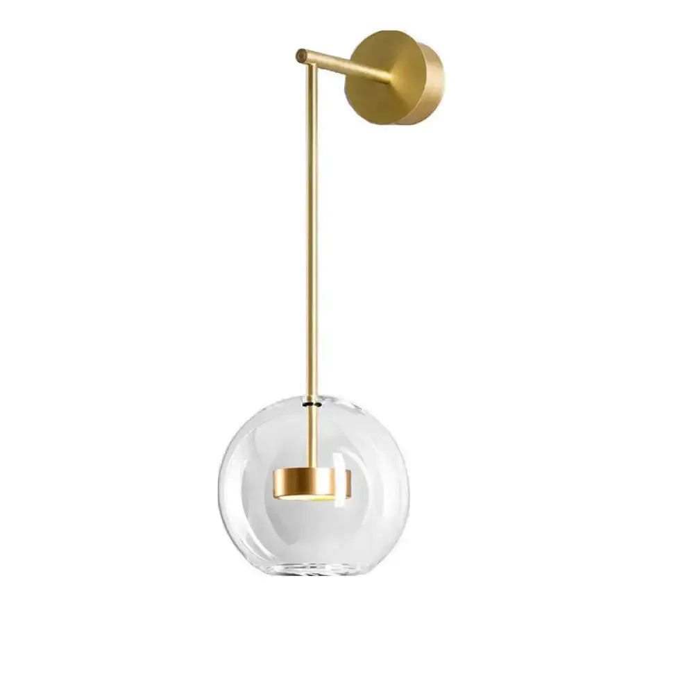 Gold-finish bedside LED wall lamp with clear glass globe on Tampa Home & Garden Store