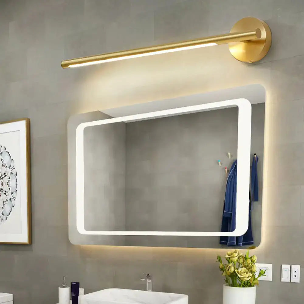 Gold LED wall light by Decorbites over a modern backlit bathroom mirror on Tampa Home & Garden Store