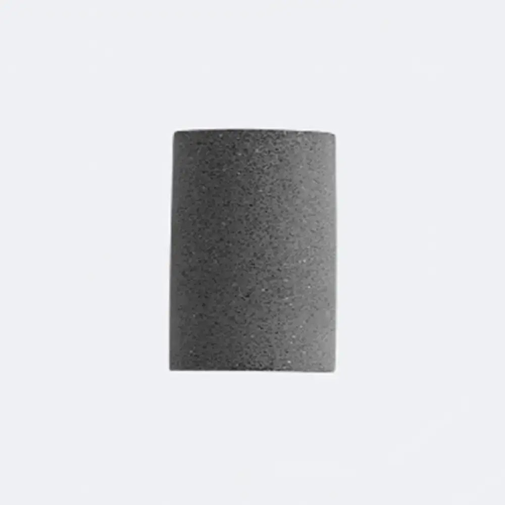 Speckled concrete wall light, cylindrical dark-gray sconce with rough textured finish on Tampa Home & Garden Store
