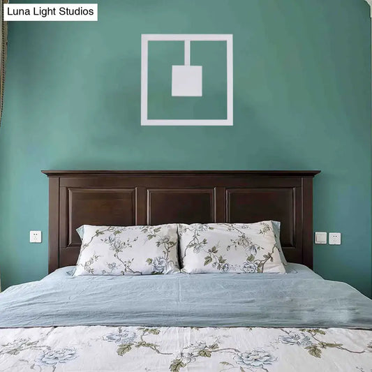 White Acrylic Dual-Voltage Metal Wall Light by Decorbites with square pendant on teal wall on Tampa Home & Garden Store