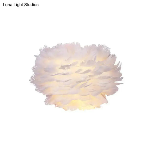 White floral feather wall mount light by Decorbites with a round soft feather shade wall sconce on Tampa Home & Garden Store