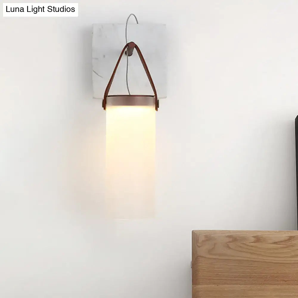 White Leather Wall Light by Decorbites with frosted glass shade and brown leather strap on Tampa Home & Garden Store
