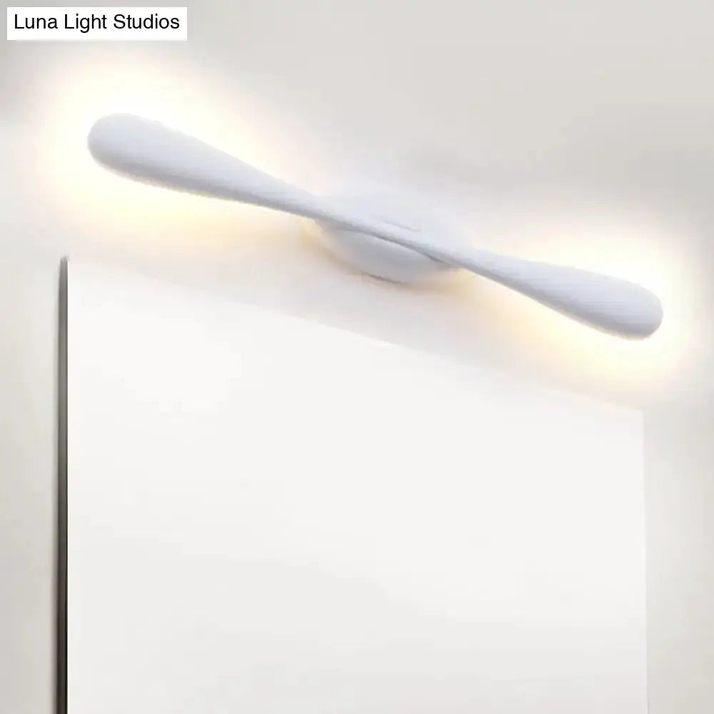 Minimalist white linear wall sconce by Decorbites, curved bar with warm LED glow on Tampa Home & Garden Store