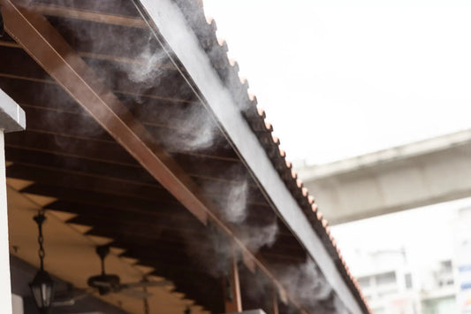 Professional Brass Slip Lok mist cooling system component on wooden outdoor pergola on Tampa Home & Garden Store