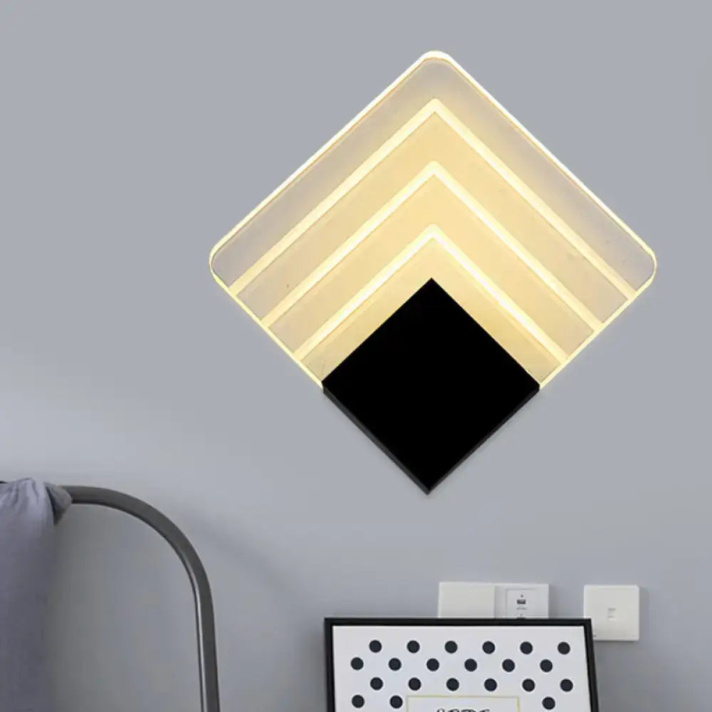 Decorbites silver black square sconce wall light with layered square frames and warm glow on Tampa Home & Garden Store