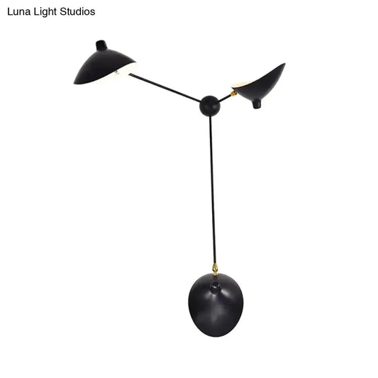 Modern black and brass duckbill wall lamp with metallic shade Decorbites living room on Tampa Home & Garden Store
