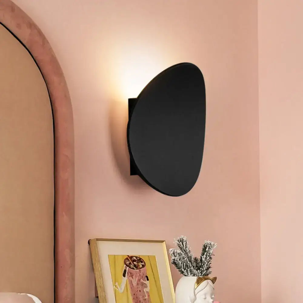 Black geometric wall fixture round disc sconce by Decorbites, modern metal wall light on Tampa Home & Garden Store