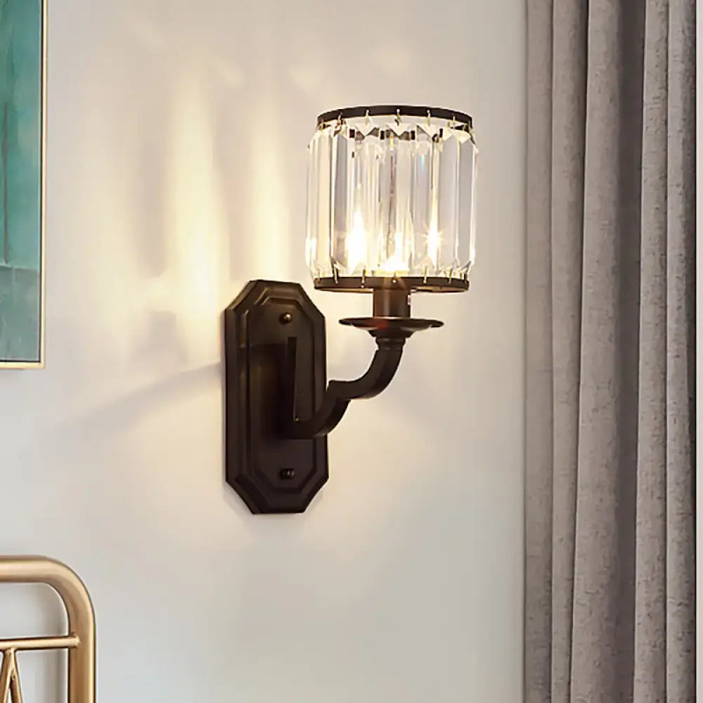 Black Gold Crystal Sconce with clear crystal shade wall-mounted on Tampa Home & Garden Store