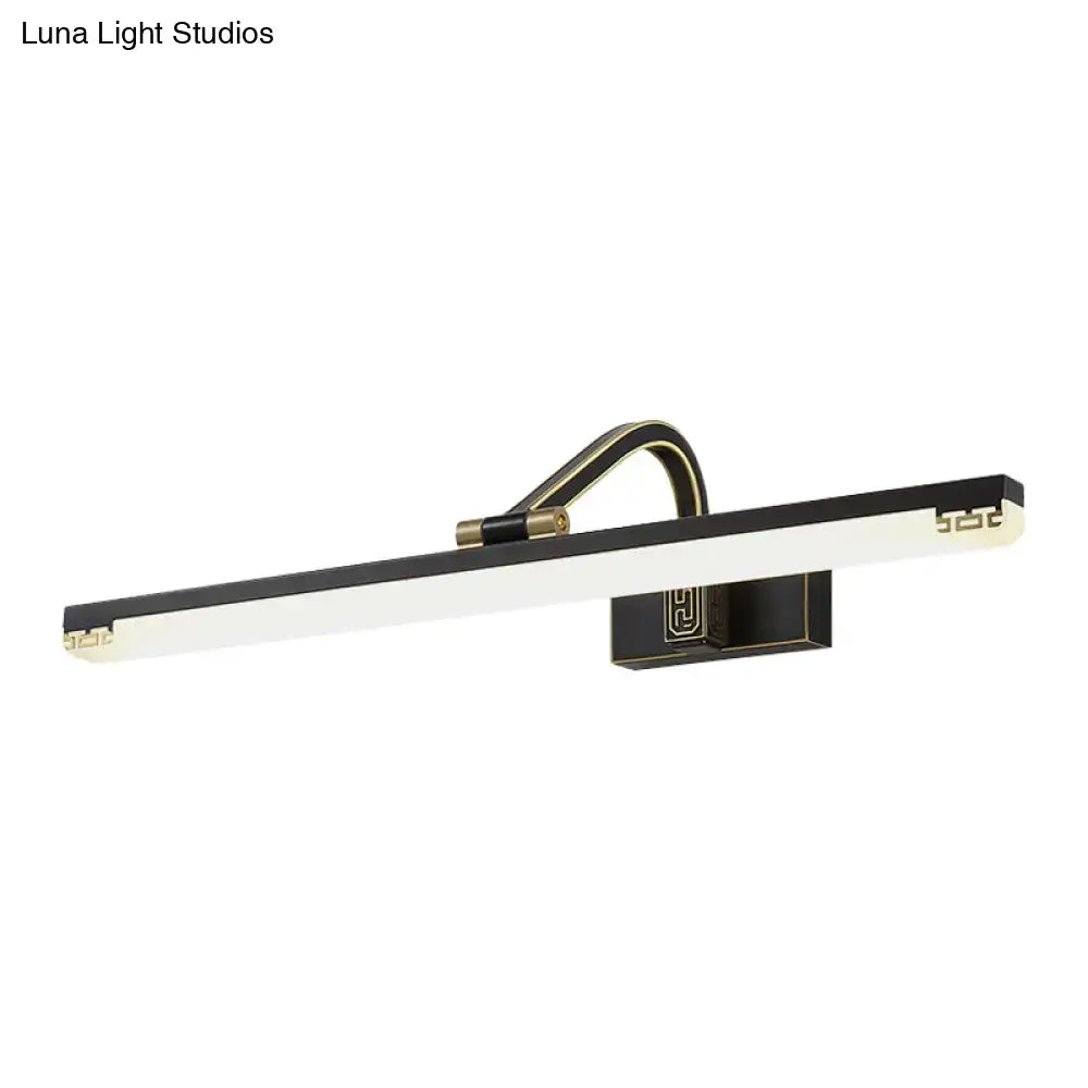 Black Gold Swing Lamp rectangular LED bar, black body with gold accents, wall-mounted on Tampa Home & Garden Store